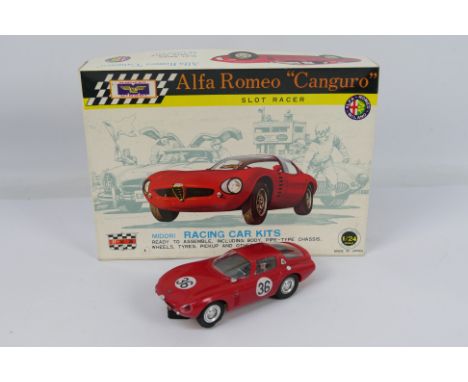 Midori - A boxed 1:32 scale Alfa Romeo Canguro slot car # FT16-36. The model appears in Good condition with only light signs 