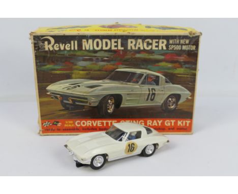 Revell - A boxed 1:32 scale Chevrolet Corvette Sting Ray GT slot car # R3102. The model appears in Very Good condition with o