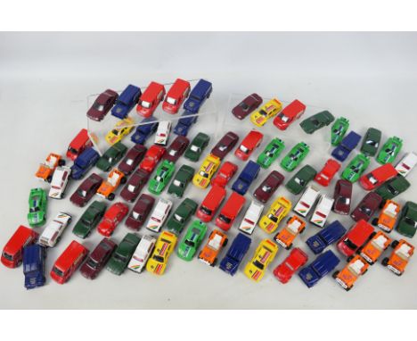 Corgi Juniors - An unboxed group of Corgi Junior diecast model vehicles. Lot includes Land Rover ' Duckhams Race Support'; Ci