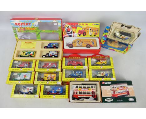 Corgi - Lledo - A collection of 15 boxed diecast model vehicles in various scales. Lot includes Corgi #05404 The Beatles 'Yel