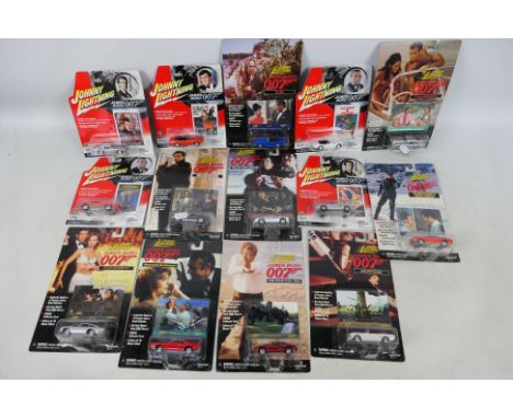 Johnny Lightning - A carded collection of 14 James Bond themed diecast 1:64 scale model vehicles from Johnny Lightning . Lot 