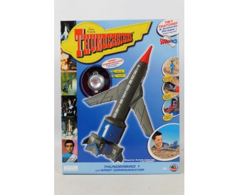 Thunderbirds - Gerry Anderson - Vivid Imaginations - Thunderbird 1. A boxed, sealed #58251 Thunderbird 1 with Wrist Communica