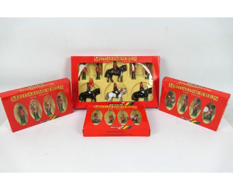 Britains - Four boxed sets of Britains soldiers from the Britains Metal Models range. Lot consists of Britains #7249 Queens C