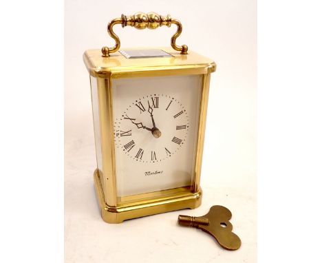 An English made eight day maritime brass carriage clock with key, 13cm tall 