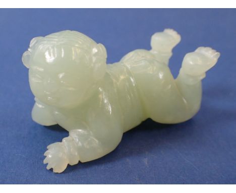 A Chinese carved jade baby, 5.5cm long