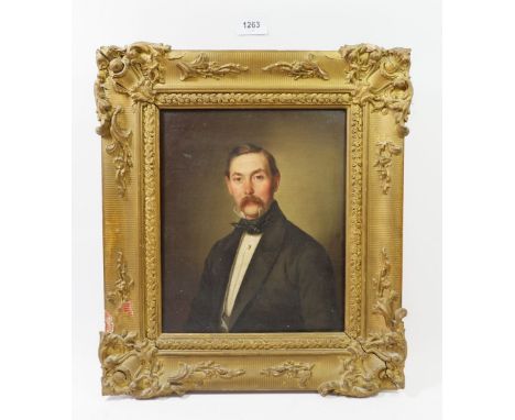 A 19th century German oil on canvas portrait of a gentleman, 28 x 23cm 