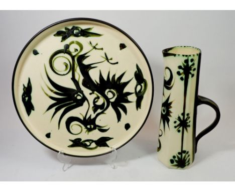 A Celtic studio pottery tray, 33cm diameter and jug 29cm tall, Newlyn Cornwall 