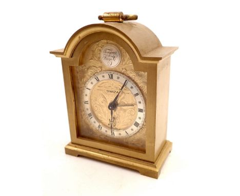 A Swiza brass arch top alarm clock, 9cm tall 