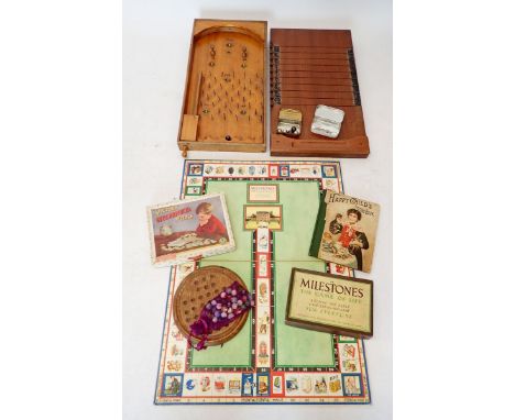 A group of old parlour games including 'Shove half Penny', Bagatelle, solitaire, Game of Life Milestones etc. 