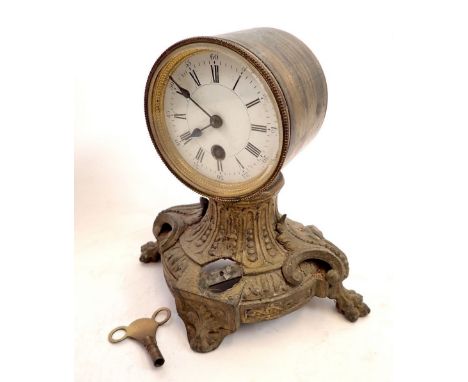 A gilt metal drum cased mantel clock on bracket base, 21cm tall 