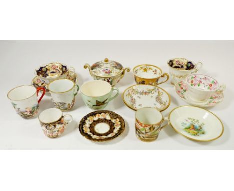 A collection of 19th century coffee cans and tea cups and saucers including Naples, many unmatched 