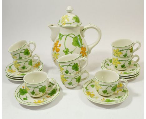 A Villeroy &amp; Boch Geranium pattern coffee set comprising eight cups and saucers and coffee pot, 24cm high 