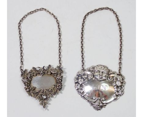 A silver decanter label for Gin with cherub head and vines, Birmingham 1963, Turner &amp; Simpson and another plain one, Birm