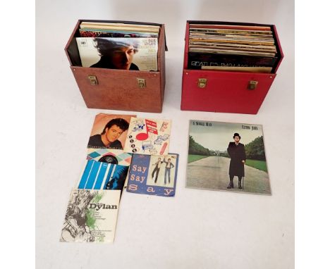 A quantity of records in two cases including Bob Dylan etc. 