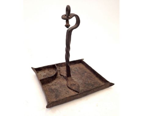 A 17th/18th century blacksmith made wrought iron rush light drip tray 14cm tall