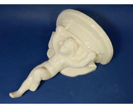 A Poole large cherub pottery wall bracket, 29cm tall 