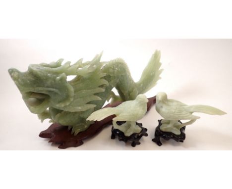 A large modern green jade style dragon, 32cm long and two birds 