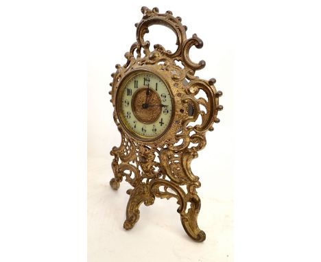 A 19th century French brass scrollwork easel mantel clock, 27cm tall 