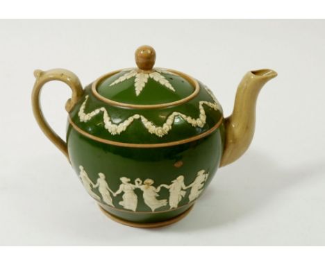 An Edwardian Copeland Spode green stoneware teapot decorated dancing women, 13cm tall 