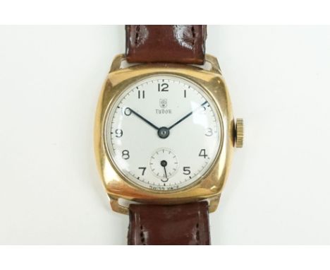 1940s Tudor 9ct gold wrist watch. The watch having a round face with silvered dial and arabic numerals to the chapter ring an