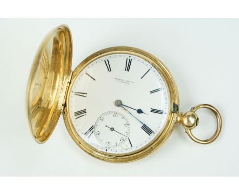 18ct gold full hunter pocket watch having a white enamelled dial with roman numerals to the chapter ring and subsidiary dial 