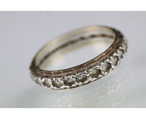 Vintage 9ct gold and silver white stone eternity ring. The ring set with round cut white stones throughout with a yellow gold
