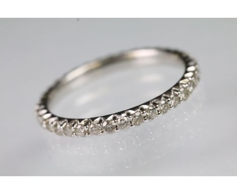 9ct white gold and diamond full eternity ring set with round brilliant cut diamonds throughout the ring. Hallmarked London 20