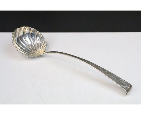 18th Century silver hallmarked punch ladle having a shell formed bowl with floral detail to the handle. Hallmarks rubbed. Mea
