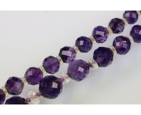 1930s amethyst and rock crystal beaded necklace, strung with faceted spherical beads with rock crystal spacers and a spring r