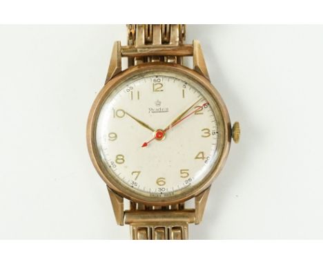 Vinateg Roidor 9ct gold wrist watch having a round face with gilt arabic numerals to the chapter ring. Case hallmarked, strap