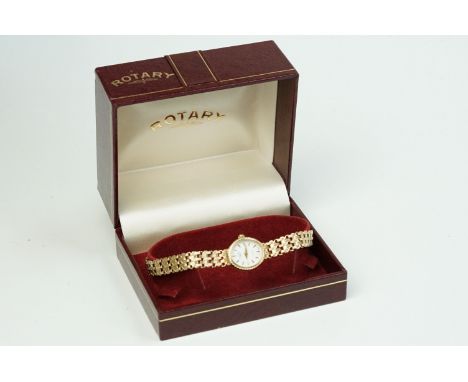 Rotary 9ct gold wrist watch having an oval face with fancy  link bracelet. Complete with original box. Bracelet marked 0.375,