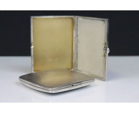 Two vintage silver hallmarked compacts to include a rectangular compact with sunburst case (hallmarked Birmingham 1922), and 