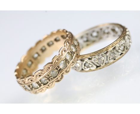 Two 9ct gold eternity rings set with white stones, both of two tone design. One hallmarked Birmingham 1947 and Birmingham 196