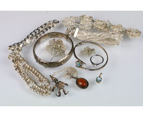 Collection of silver jewellery to include a cross over bangle set with an opal cabochon, hinged bangle, flat link bracelet, a
