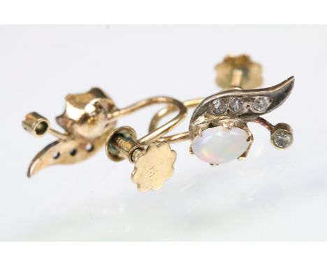 Pair of early 20th Century opal and diamond screw back stud earrings. The earrings of foliate design set with round cut diamo