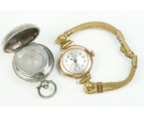 Early 20th Century 9ct gold open faced wrist watch with arabic numerals to the chapter ring. Inner case hallmarked 1919. Toge