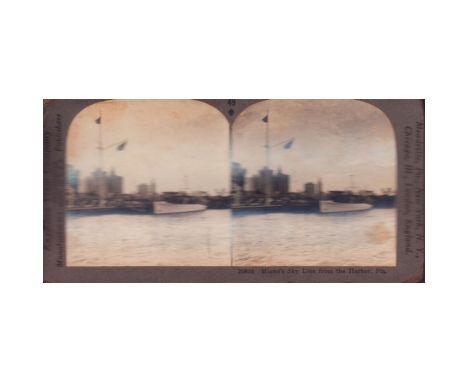 In the distance a row of Model T automobiles. Produced by Keystone View Company. Stereoscopy is the production of the illusio