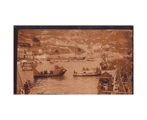 Black and white photo; Naval Battle of Flowers on the French Riviera near Villefranche-sur-Mer.The Naval Battle of Flowers is