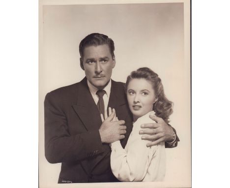 Portrait of Errol Flynn and Barbara Stanwyck from the 1947 Warner Bros. Film 'Cry Wolf�. Issued: c. 1940Dimensions: "L x 8.25