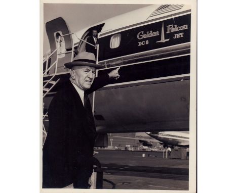 Rare photo of Eddie Rickenbacker, WWI American fighter pilot, standing in front of the 'Golden Falcon' DC-8 Jet.In 1935, Eddi