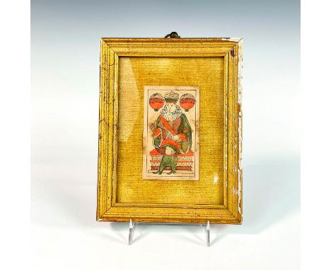 Playing card depicting a king. Framed in a wood and plaster frame with velvet backing.Card measurements: 4in H x 2.5in L. Fra