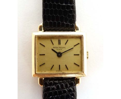 Wristwatch : Patek Phillipe , a 18ct (.750 ) gold cased square cased wristwatch , the signed gilt dial with pointed straight 