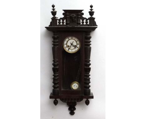 Vienna Wall Clock : a sprung driven walnut cased wall clock striking on a coiled gong with a grid iron compensating pendulum 