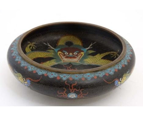 A signed cloisonne gilt metal and enamel bowl with image of 5 toed dragon with four character mark under. 8" wide  CONDITION:
