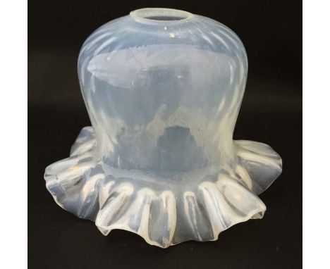 A c.1900 vaseline glass lamp shade with fine netted design with frilled rim. Length 4 3/4" CONDITION: Please Note -  we do no