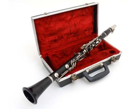 Musical Instruments : A mid - 20thC ' Regent ' Clarinet by Boosey & Hawkes , London , approximately 26 1/2" long . Serial No 
