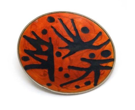 Scandinavian Jewellery : A silver brooch with red guilloche enamel and black enamel abstract decoration.   Marked Sterling No