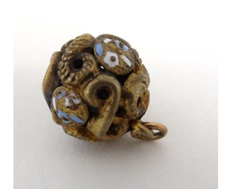 A gilt metal pendant of spherical form with enamel decoration. Approx  ½” diameter  CONDITION: Please Note -  we do not make 