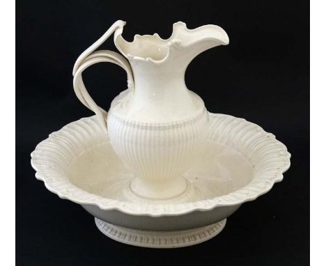 A Leedsware Classical Creamware basin and ewer pitcher , bears impressed makers mark to stand. Jug 10 1/2'' high.  CONDITION: