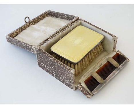 A silver backed hairbrush of rectangular form with yellow guilloché enamel decoration  hallmarked Birmingham 1927  maker Henr